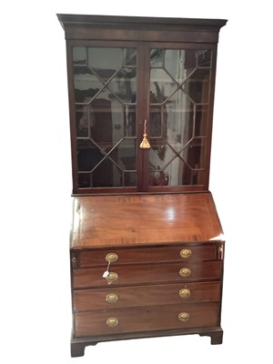 Lot 1269 - George III mahogany bureau bookcase