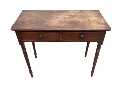 Lot 1290 - Regency mahogany two drawer side table, raised on ring turned legs, 88cm wide x 42cm deep x 74cm