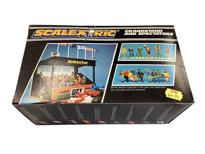 Lot 120 - Scalextric Grandstand & Spectators, boxed C705, Racing Figures C709, Pit Crew C635 & Spectators C634, all on card, Trade pack of 6 (3 sets) Bridge Supports, loose spectators, barriers, t...