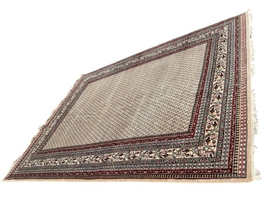 Lot 1352 - Large woolen Ushak style carpet