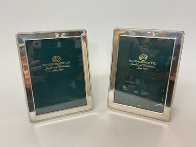 Lot 17 - Pair of silver photo frames with beaded edges, retailed by Winsor Bishop