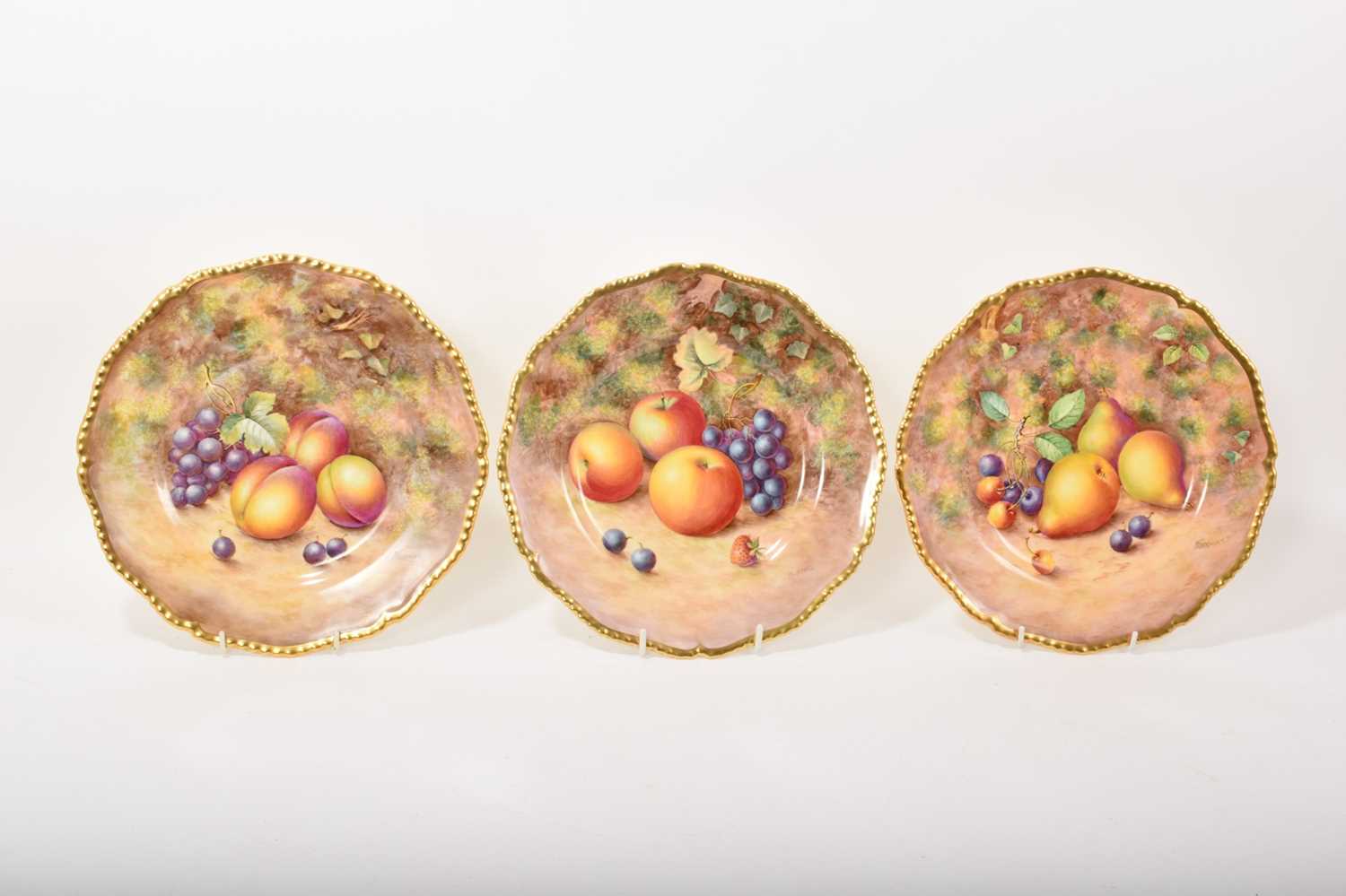 Lot 186 - Three Royal Worcester fruit painted plates, including two by Freeman and one by Ayrton