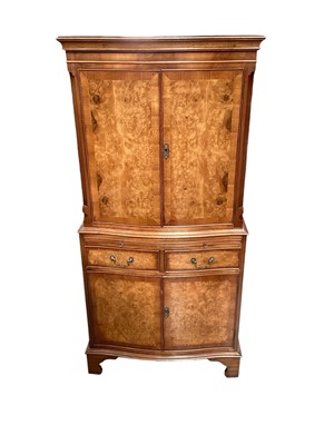 Lot 1310 - 1950s walnut veneered cocktail cabinet