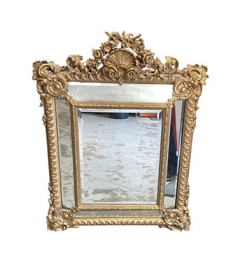 Lot 1313 - Late 19th century Rococo wall mirror