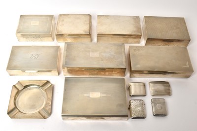 Lot 457 - Eight silver cigarette boxes, three silver vesta cases, silver match book case and a silver ashtray