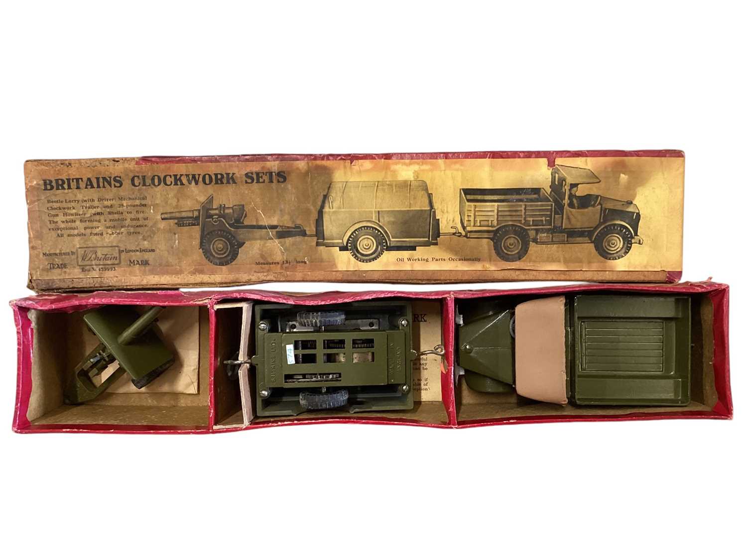 Lot 124 - Britains Clockwork Sets Beetle lorry, mechanical clockwork trailer with key & Howitzer 25 Pounder field gun, boxed (poor stained) No.2048 (1)