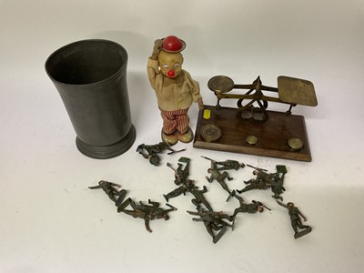 Lot 620 - Japanese tinplate toy 'Joe's Hamburger', group of lead soldiers, set of postal scales and an antique pewter mug