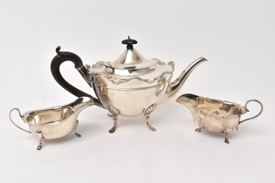 Lot 448 - Silver teapot and two silver sauce boats