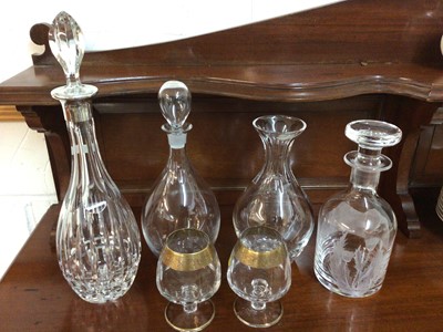 Lot 617 - Group of glassware to include a Mappin & Webb silver mounted cut glass decanter (London 1977) Orrefors 'Prelude' cut glass decanter, Stuart Crystal etched glass spirit decanter and a Royal B...