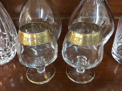 Lot 617 - Group of glassware to include a Mappin & Webb silver mounted cut glass decanter (London 1977) Orrefors 'Prelude' cut glass decanter, Stuart Crystal etched glass spirit decanter and a Royal B...