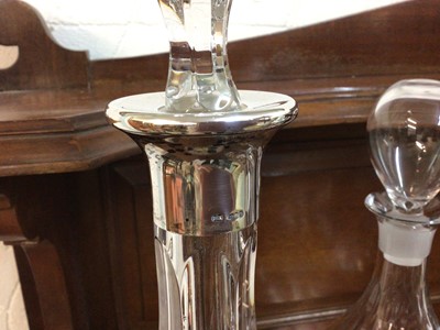 Lot 617 - Group of glassware to include a Mappin & Webb silver mounted cut glass decanter (London 1977) Orrefors 'Prelude' cut glass decanter, Stuart Crystal etched glass spirit decanter and a Royal B...