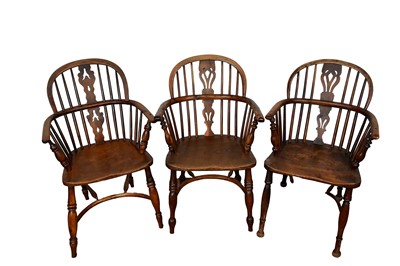 Lot 1534 - Matched set of three early 19th century yew and elm Windsor armchairs