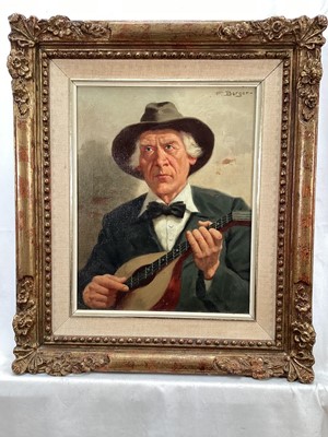 Lot 102 - Franz Berger, oil on canvas, A 20th century of a mandolin player, wearing a wide brimmed hat, signed in gilt frame. 29 x 23cm.