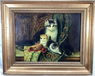 Lot 104 - Continental School 20th century, oil on panel, A cat and her kittens on a rug, indistinctly signed. 30 x 40cm.