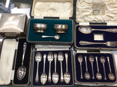 Lot 1115 - Set of six silver Corinthian coloumn coffee spoons, plated set of teaspoons, other silver flatware in fitted cases, pair of silver salts and a silver cigarette box