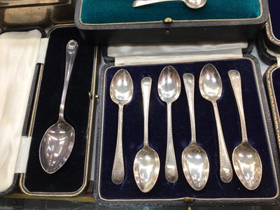 Lot 1115 - Set of six silver Corinthian coloumn coffee spoons, plated set of teaspoons, other silver flatware in fitted cases, pair of silver salts and a silver cigarette box
