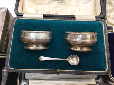 Lot 1115 - Set of six silver Corinthian coloumn coffee spoons, plated set of teaspoons, other silver flatware in fitted cases, pair of silver salts and a silver cigarette box
