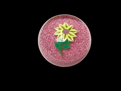 Lot 1155 - Paul Ysart glass paperweight, yellow flower on a speckled pink ground, label to base