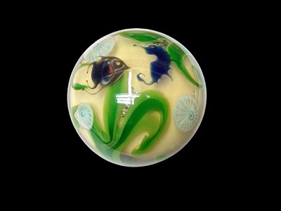 Lot 1156 - Lundberg Studios glass paperweight, decorated with a seahorse, fish, sea urchins and seaweed, signed and dated 1976