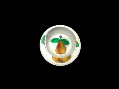 Lot 1162 - St. Louis glass paperweight decorated with a pear on a white ground, dated 1992