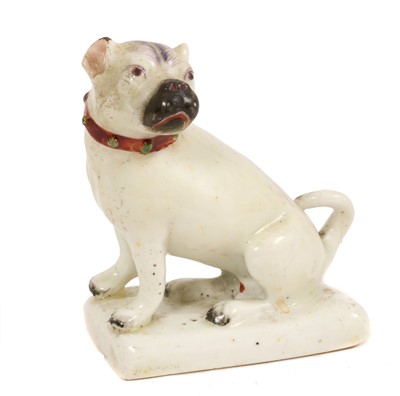 Lot 241 - Derby model of a pug, circa 1765, shown seated on a rectangular base, wearing a collar and with enamelled decoration