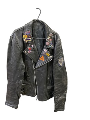 Lot 129 - Leather biker jacket with M.C.C. Vagabonds 1947 cloth badge, and various enamel badges