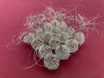 Lot 157 - Contemporary wire work sculpture formed as sixteen plant bulbs, 22cm sqaure