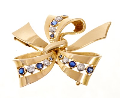 Lot 757 - Art Deco gold diamond and sapphire bow brooch