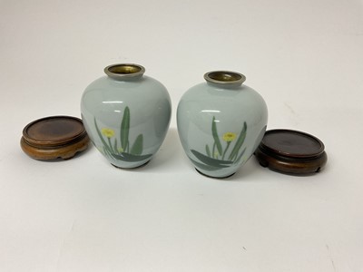 Lot 66 - Unusual pair of Japanese enamelled vases on stands