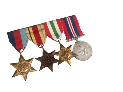 Lot 723 - Second World War medal group comprising 1939 - 1945 Star, Africa Star, Italy Star and War medal (mounted on bar).