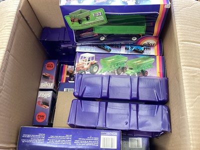 Lot 175 - Diecast selection of boxed Farm models including Britains, Universal Hobbies, Lone Star, Solido etc. (3 boxes)