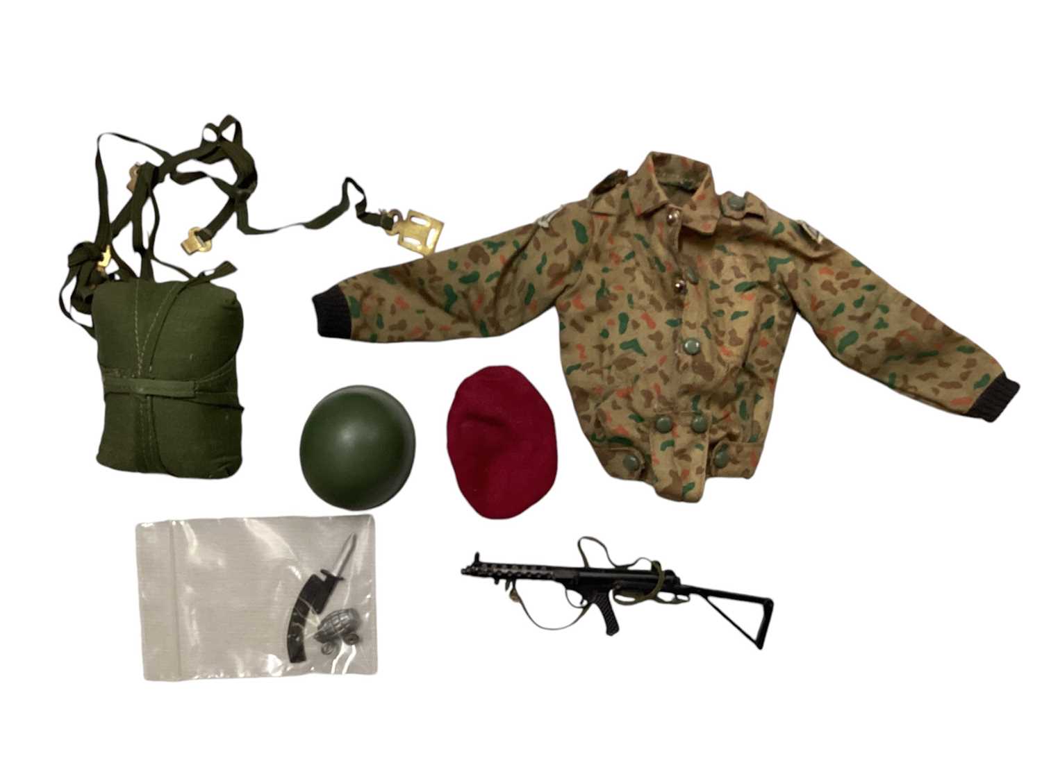 Lot 159 - Pedigree vintage Tommy Gunn uniforms & equipment including Paratrooper kit, Operations Map, Radio, Boots & Gaters, Trench Spade, Kit Bag, Helmet, First Aid Bag only, Mines, webbing &...