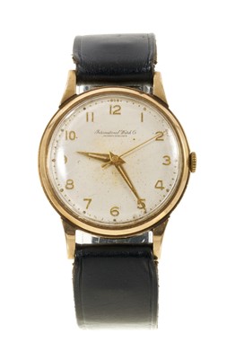 Lot 806 - 1950s IWC 9ct gold wristwatch on leather strap, circa 1958.