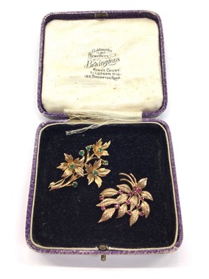 Lot 1014 - Two 1970s 9ct gold gem set floral spray brooches