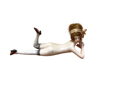 Lot 1100 - Antique German bisque porcelain doll in the form of a naked reclining lady, with real hair.