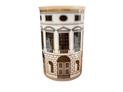 Lot 1108 - Vase, Rosenthal, Classic mark, 20th c., design Piero Fornasetti (1913-88), cylindrical form, surrounding architectural print decoration 'Palladiana' in black on white, gold rim, h. 18.5 cm