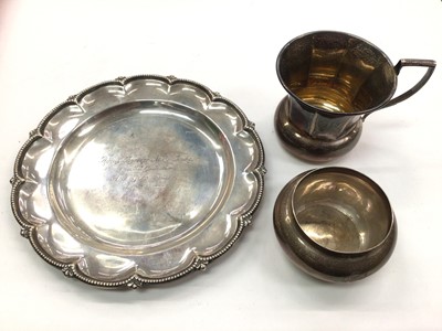 Lot 1050 - Edwardian silver dish with engraved inscription, Edwardian silver bowl with engraved monogram and a 1930s silver mug (3)