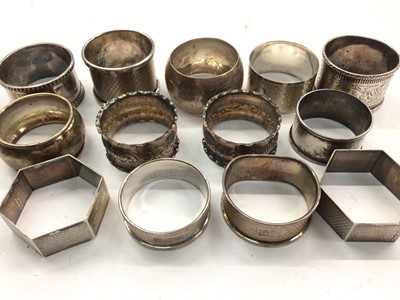 Lot 1097 - Collection of 13 various silver napkin rings