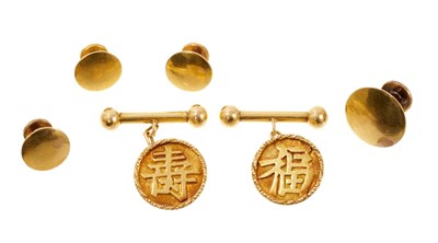 Lot 735 - Late 19th century Chinese gold cufflinks and dress studs, each decorated with a Chinese symbol denoting Luck, Harmony, Peace, Wish, Longevity and Fortune (5)