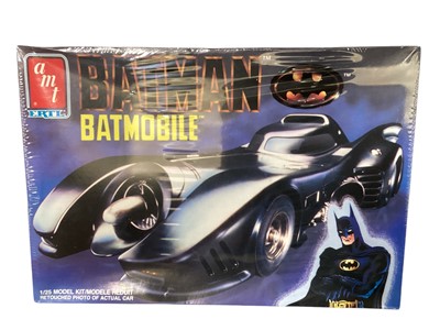 Lot 219 - AMT ERTL 1:25 scale Batmobile (x2), Snapfast Batmissile & Batman Returns movie photo cards, all sealed (1box)