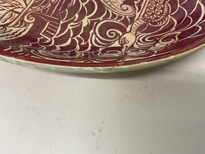 Lot 200 - William de Morgan ruby lustre 'galleon' charger, with monogram for Halsey Ricardo, Christie's 2003 label verso, 36cm diameter