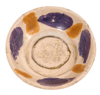 Lot 206 - Quentin Bell (1910-1996), art pottery dish with lustre splash decoration, inscribed 'Save Charleston' to centre, 10.75cm diameter