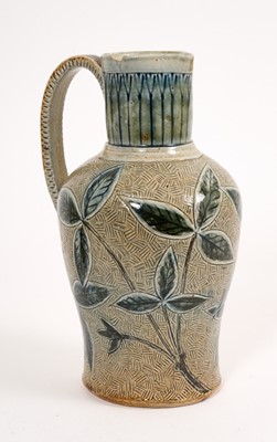 Lot 210 - Martin Brothers stoneware jug, late 19th/early 20th century, decorated with foliage in tones of blue and green, signed to base, 19.5cm high