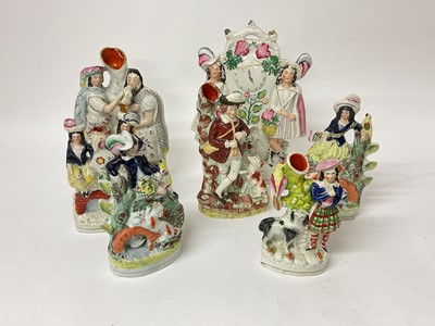 Lot 12 - Group of Victorian Staffordshire figures and spill vases