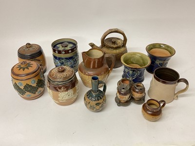 Lot 11 - Four Royal Doulton tobacco jars, together with other Royal Doulton and other stoneware