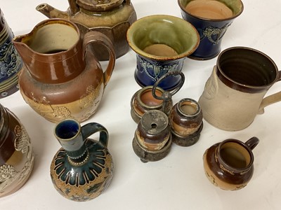 Lot 11 - Four Royal Doulton tobacco jars, together with other Royal Doulton and other stoneware