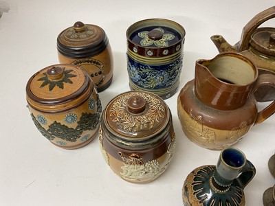 Lot 11 - Four Royal Doulton tobacco jars, together with other Royal Doulton and other stoneware