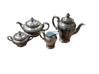 Lot 616 - Unusual WMF silver plated porcelain four piece tea and coffee set of melon shape