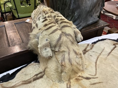 Lot 1739 - Early 20th century tiger skin on black backing, probably by Van Ingen, nose to tail 260cm x paw to paw 190cm