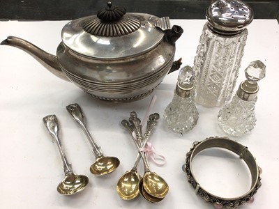 Lot 1120 - Silver teapot, silver mounted glass sugar castor and pair of scent bottles, pair of mustard spoons, set of six spoons and a white metal bangle